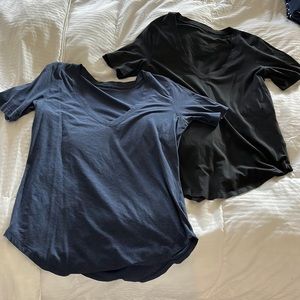 Two lululemon V neck tee’s. Both size medium! Very comfy shirts. Too big on me
